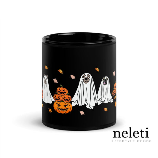 Black mug featuring playful ghosts and pumpkin illustrations for Halloween